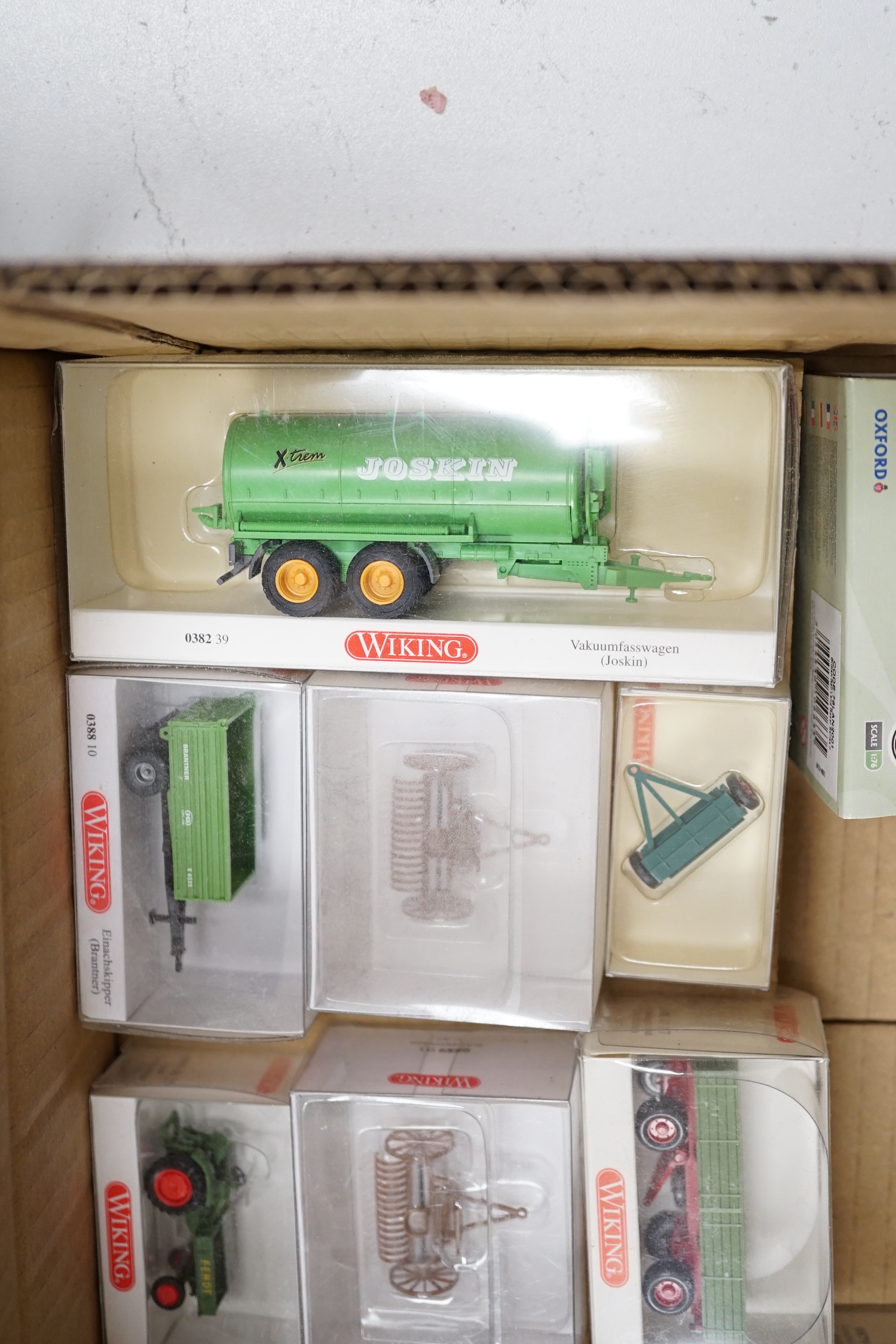 Forty boxed OO and HO gauge 1:76 scale vehicles by Oxford Diecast, Wiking and Classix, including commercial vehicles, cars, farm, vehicles, trailers, etc.